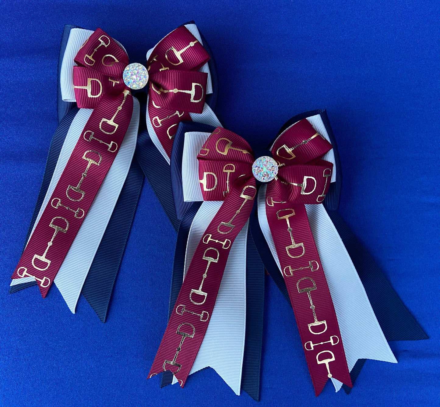 Maroon equestrian bows