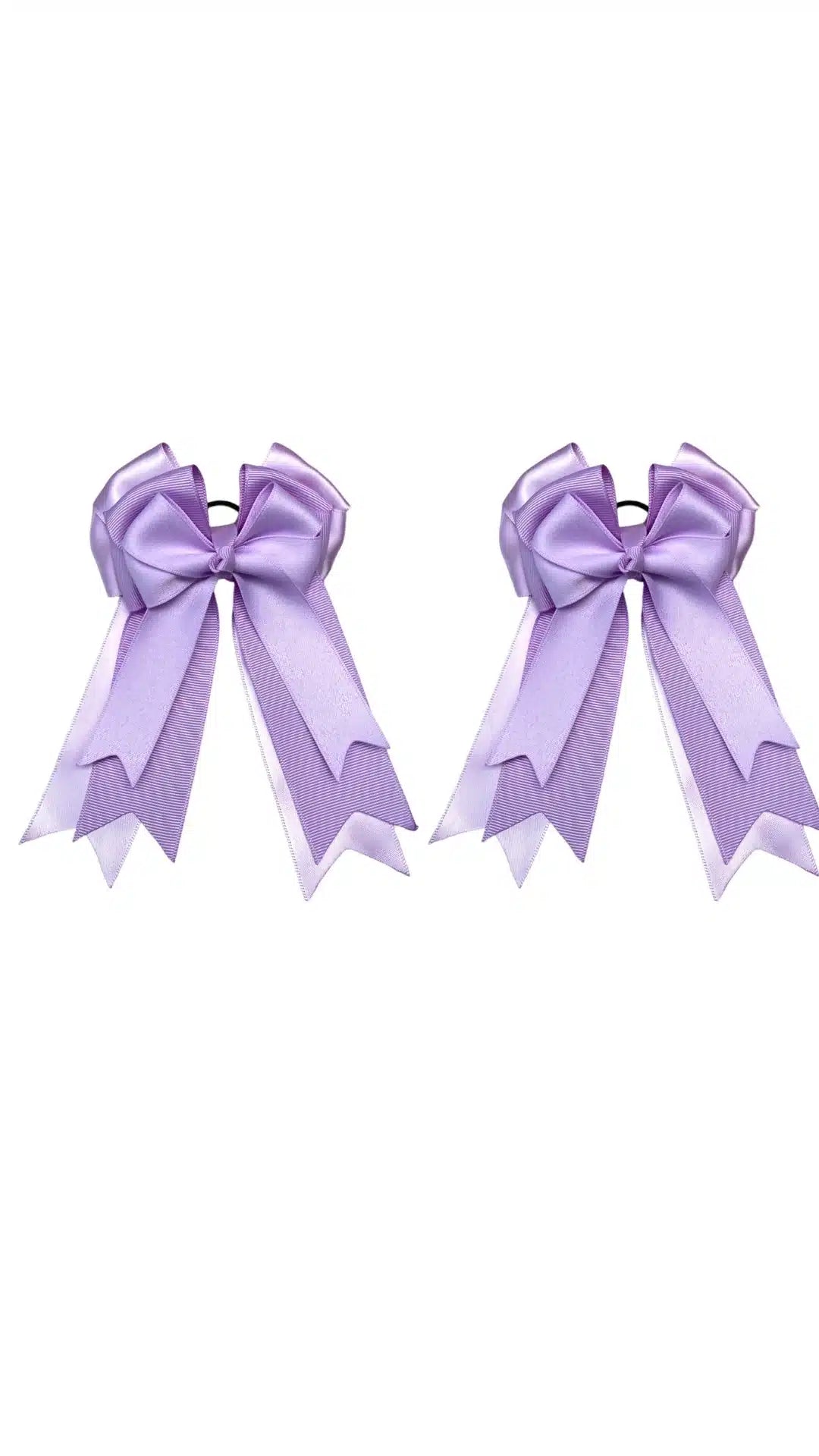 Purple equestrian bows