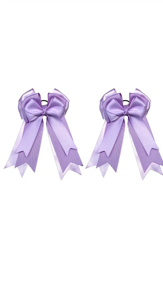 Purple equestrian bows